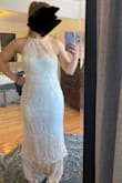 I loved the style of the top and back on this, but the lace seemed cheap (and like it would snag on everything) and didn't fit like other mediums from Lulus usually fit me - just a little too baggy. I didn't understand the tier at the bottom, either. Overall, not for me. - Jenny W.