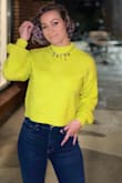This sweater is a unique bright color. If fits perfectly. The material is really soft. - Lexi T.