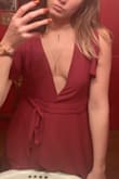 Discrete sexy, absolutely in love. Biggest complaint is the constant titty check so I suggest adding a pin or button or getting double sided tape. I also sized down. But dress overall is cute and complimented my figure. Worth getting and then spend the extra 10 to get fitted. (Picture has added button & no tape, but you can see the what I mean) - LeClare B.