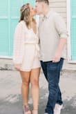 I hesitantly bought this for engagement photos because there wasn't many reviews but I am glad I did! It's adorable. However, its really hard to get in and out of because there is no stretch or zipper so would not recommend if you are going to wear it for a long time/have to pee etc. - Sami V.