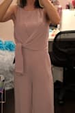 Purchased this mauve jumpsuit for my daughters destination wedding in March.   I did have a small issue with one of the seams on the jumpsuit so I contacted the customer service department through the chat. They were amazing to work with! I am very satisfied and so excited to wear my new jumpsuit very soon! - Kelly C.