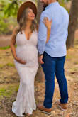 The dress was perfect for my maternity pictures! It was stretchy around my tummy it almost didn't fit around my bust area. - Isabel G.