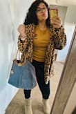Purchased this in a L just so I can layer up under the sweater . It's a little big but it's that style you can wear a little baggy. It's super soft & warm, I love the color & style super cute ! Honestly love how it fits in me ! (: - Vanessa M.