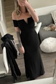 This dress fits beautifully. After reading reviews I was worried I should have sized up. But I found with the stretch the small fit perfect and anything else would have been too big. - Alexandra H.