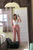 These are super soft, sexy, and comfortable! I love this tank so much that I have it in 4 different colors (white, yellow, tan, and light blue) - and I'm planning on getting the black once it's back in my size! I probably wear the white one most often. I am typically a medium in tops but I wear a large in these. The medium is just too tight on me, especially my waist. I will say that the large can get a little loose near the armpits after a few hours of wearing it but it's not really that noticeable and it's just more comfortable than the medium on me. And regardless it holds the girls in nicely without a bra. Plus you can't see through any of the colors thanks to the layered fabric! I also have a couple of skirts from Lulu's that I love pairing these with :) Definitely a closet staple! - Stephanie C.