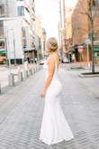Wore this for my second wedding. Stretch material made it comfortable to wear all day. Returned a small because too big in the chest. The x-small was better fit. - Susan O.