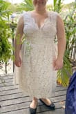 I'm looking for a casual, yet pretty, wedding dress for my outdoor venue. This dress was gorgeous! I was worried about the size because my measurements put me at a 1X, but that was unavailable. I consulted with a store rep via email who was very helpful in deciding whether to try it, and ultimately I ordered it because there's free returns just in case. Wow is it cute... and it had pockets!! The material is not stretchy but it fit me great anyways! I'm so glad I gave this dress a try- I SAID YES TO THE DRESS! - Kaitlyn B.