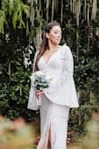 This dress was more than what I hoped it would be. So unbelievably beautiful! It looks like a $1000 dress, amazing quality. The shoulder area and neckline was a little loose, but I had my grandma tighten it up and it was great. Someone with a bigger bust might not have the same issue. - Kaja S.