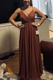 Love the dress! Fits perfectly and isn't too long. I have to get every single dress hemmed and this one seems to be the perfect length with heels. The straps are adjustable and the chest isn't too low cut. The fabric is soft and comfortable and definitely able to dance in! - Savannah F.