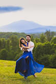 I wore this for my engagement photos and it came out stunning! The only thing I would say is that if you're smaller chested it can be a little loose in that area. It is also quite long, I had to have about 6 inches hemmed off the bottom, but it is a beautiful dress nonetheless. - Nava K.