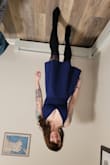 This dress is so flattering and fits like a glove! Very supportive but also flattering for busty gals, no bra needed. Dressed up to go to the Living room this New years Eve with the dog and my boyfriend. For some reason I cannot get the picture to not be upside down! - Alyssa M.