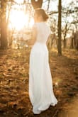I decided to elope last minute and was having trouble finding a local wedding dress shop that had an appointment that fit with my schedule. I tried on many white dresses from Lulu's but did not love any of them. I ordered this as a last minute dress just to try. I immediately fell in love with the lace but also how heavy and smooth the bottom was. If you are looking for a simple yet elegant wedding dress this is the perfect! - Connor D.
