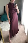 Like everyone else has said, the top is too loose and baggy, even for the style, and I'm a 34G. Also the collar is way too big on my neck. Other than that it's a great dress, surprisingly long (I'm 6'0"), beautiful color and nice material. - Kylee S.
