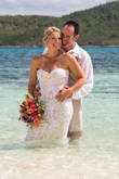 This dress was so beautiful, so comfortable and perfect for my beach wedding! Bust/rib area is small and is my only complaint. I had to have it altered and have zipper removed and added corset strings. I was pulling dress up
all day, but it was a small price to pay for a dress that fit like a glove. - MONICA C.