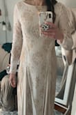 Dress fits true to size, is pretty but not for me. Compared to expensive wedding dresses you can tell it's not the same quality but still very nice- especially for the price. - Christina M.