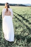 Like many other 2020 couples, my husband and I opted to postpone our big celebration and get married with just our immediate family present this past fall. We had a riverbank ceremony just before sunset, and this dress was perfect! I just had it hemmed and likely could've afforded to have it taken up in the shoulders/arms but didn't due to time constraints. I was very comfortable and have gotten so many compliments from people who have seen pictures. This is a good quality dress for a great price! Will definitely try to recycle it for another purpose for our larger celebrations! - Ashley A.