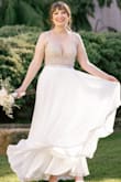 This was my wedding dress and I am absolutely enamored with it. I had to get it taken up but other than that it fit perfect. - Nina K.