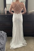 I had a similar more expensive dress picked out when I saw this dress on Lulus and I immediately fell in love with it. I was nervous ordering online/without trying it on first and what the quality would be like, but the dress is gorgeous and very well made. The attention to detail makes it hard to believe that this dress is under $300. I love how you can cinch up the back for a perfect fit & the cups in the bodice is nice, so I don't have to purchase a separate bra. I ordered up (a size 6) based on the size chart, my normal size in Lulus clothing is a 4/Small and I'm so glad I did. It fits perfectly and will not need any alterations.  I can't wait to wear this dress in October when my fiancé and I elope on the beach! - Jessica C.