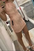 This dress is great and super flattering. I'm always right in between extra small and small. I decided to go extra small because the back being open allows for more adjustments with the strings. Love it and it'll be perfect for Vegas! - Tori A.