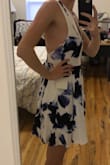 This dress length is true to the model, I ordered a medium and am 5'8", it falls at mid-thigh. I love it! Note that the side of the dress is more bare than the stock photo lets on. It's a gorgeous dress!!! - Stephanie C.