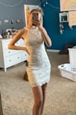 This dress is so cute! However most dresses that I order from Lulus comes a little big so typically I would wear a small or an extra small but an xxs fit very well. The material was great! would definitely recommend! - Sydney C.