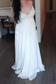 My wedding isn't for a while but when I saw this dress I knew it was the one! It's so simple yet so beautiful! I have no idea why it isn't part of their bridal collection! I'm currently losing weight so the dress didn't fit properly as I ordered a size down but that was to be expected. I put "a bit small" above because a small usually does fit well but I'm glad it wasn't a perfect fit as I still have 20 more pounds to go! I highly suggest this beautiful gown! - Melissa W.