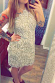 I ordered this dress along with another one for graduation to try to pick between the two and I cannot! This dress is simple in some ways, but elegant and beautiful at the same time! I love this dress! I ordered a size up, but after a few minor adjustments it fit perfectly! - Sebien J.