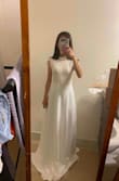 I'm 5'1 and 92-95lbs and xxs fits me perfectly. The bottom materials feel really nice and overall this is a very nice dress. If you have a big belly (like me), it might show. You probably will need a shaping brief lol I will be wearing this at my elopement. Can't wait! - Amy N.