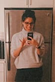 I fell in love with this turtleneck sweater. It is soft and incredibly warm. You can pair it with pants or a skirt. I love wearing this as a transition piece for work. The fit is true to size. - Abigail G.