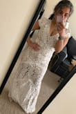 The dress looked like the pictures. So pretty! Stretchy, very comfy, lightweight, high quality, and classy. Just like I wanted. I have a short torso so the dress doesn't show my belly like the model, which I don't mind. It is a little bit long and loose on me but I will keep and I will get it fixed if I need to. - Hanin A.
