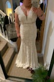Beautiful dress! I ended up choosing a different one with a little more drama, but this one fit well and was comfortable. - Caitlin W.