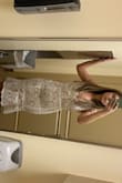 This dress is very pretty but it's too small around the hip area. Normally I'm a small but I think I would need a medium. Definitely size up! - Carolina A.