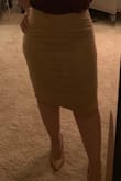 I originally had a large and had to exchange it for a medium for a more fitted look. I love the quality and the feel. The look is amazing and I absolutely love the skirt. I will definitely be ordering in a different color! - Dora P.