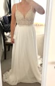 Beautiful dress on the hanger, but would have had to shorten the straps and hem the bottom for this to work. - Christine W.