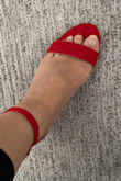 It's a half size too big. Other than that, the red color is perfect and is a comfortable height. - Sigrid W.