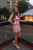 I got this dress for a Valentine's Day themed date function! I absolutely love this dress! It fit great and the little tassel things are so cute! Got so many compliments on it! Didn't have to wear a bra because the back is adjustable, and that is great because I usually always have to wear a bra. I ordered a size small. - Brianna C.