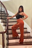 These pants are beautiful! The color is exactly as pictured! The fit was a bit weird, and it was also pretty long! Still LOVED THEM! - Shannon K.
