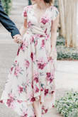 Being short, I didn't think I could pull off more of a Maxi dress look but the cut of this dress was perfect on me with heels! It looked stunning for my engagement photos and I'm so happy with the dress! I did have to sew in a tuck in the bust area but besides that, it was perfect! - Jessica R.