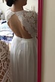 OK, so my first post got deleted, but I love this dress so much that I am willing to re-write this. When I tried this on, I could tell that the quality was great. The top is thick and well detailed, and the bottom is smooth and gorgeous. The bust is a little loose for me, but nothing a little taking in and cups can't fix! The bottom is a bit long as well, but can be hemmed or worn with high heels. I wasn't sure about purchasing this, but once I saw the thousands of positive reviews, I thought why not! I am really happy I did. I purchased this for my rehearsal dinner in October, and I am so excited! Thanks Lulus! - Angela C.