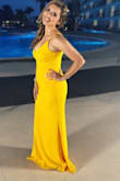 Fit like a glove. A little long but I didn't want to alter. I received so many compliments. This is perfect for any occasion. I wore it for a beach wedding. - Leticia B.