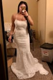 WOW! Just, WOW! This dress is beautiful! I already fell in love when I saw it online, but it's even more beautiful in person. The size 2 was too tight around my waist but overall was still true to size. Maybe if I didn't eat so much before I tried on my dress it wouldn't be so tight :) I also ordered a size 4 which fit perfectly around my bust and waist. - Rechell E.