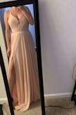 I got this dress for my engagement pictures and it does not disappoint! It's a little long but I don't mind it. The back is gorgeous and it's a perfect shade of pink for our beach photos! Shipping was very fast too which was a plus! - Ashlyn H.