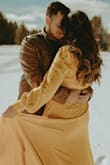 I purchased this dress for engagement pictures, and loved the way the color of it came out. It is very long, and I didn't have time to get it hemmed. - Janet I.
