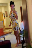 This dress hugs my body perfectly! I've been looking for a little wrap sun dress, and this one is perfect! Highly recommend for those beautiful curves :) - Claire O.