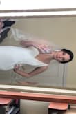 I bought this dress for my wedding after panicking about the much more expensive dress I had already purchased. This dress is gorgeous! It fits perfectly (no alterations needed just a push up bra)! The lining material is super soft and comfortable but the exterior still looks very high class. It did come a little wrinkled and I have yet to steam it but I am so excited to wear it! I actually like it better than my other dress which was $2400. Wish I'd bought this one first! - Madge S.