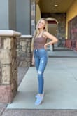I am petite so the bodysuit is a little long, but the straps are adjustable! Very stretch and super comfy! - Sydney C.