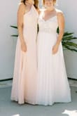 I wore this to a friends wedding, on one of the hottest days in summer! Luckily, no sweat marks showed, and I was the only bridesmaid who was semi-cool because of the slit in this dress. Worked out great, and it was the perfect length for my height! The straps come across the neck higher than I prefer, and I was adjusting quite a bit, but I'm also the type who can't wear turtlenecks. - Katelyn S.