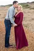 I LOVE this dress! I've gotten so many compliments on it after getting our engagement photos done. The only complaint I would have is that it is extremely long. I had to spend $40 to get it hemmed to a normal length, and I feel that my height is pretty average. Otherwise it fit and felt great! - Bethany A.