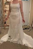 This dress is beyond beautiful. The material is thick, heavy, and doesn't look cheap at all. I instantly fell in love with this dress when I saw it and then fell even more in love when it arrived and I laid eyes on it myself. Well worth the buy, I highly recommend it. - Ashley S.