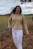 I LOVE this shirt. I love the style of the holes and big zipper, which is just enough to a simple sweater. I wear it all the time. It is perfect for Fall or Winter. It has the slightest crop which makes it fit perfectly! - Ava B.